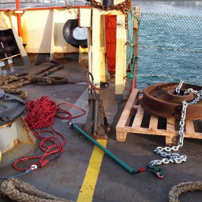 On board R/V Puerto Deseado: An old train wheel serves as mooring weight for the buoy.