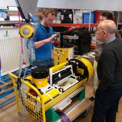 Dr. Thorben Wulff explaining the AUV to Dr. Mentaberry